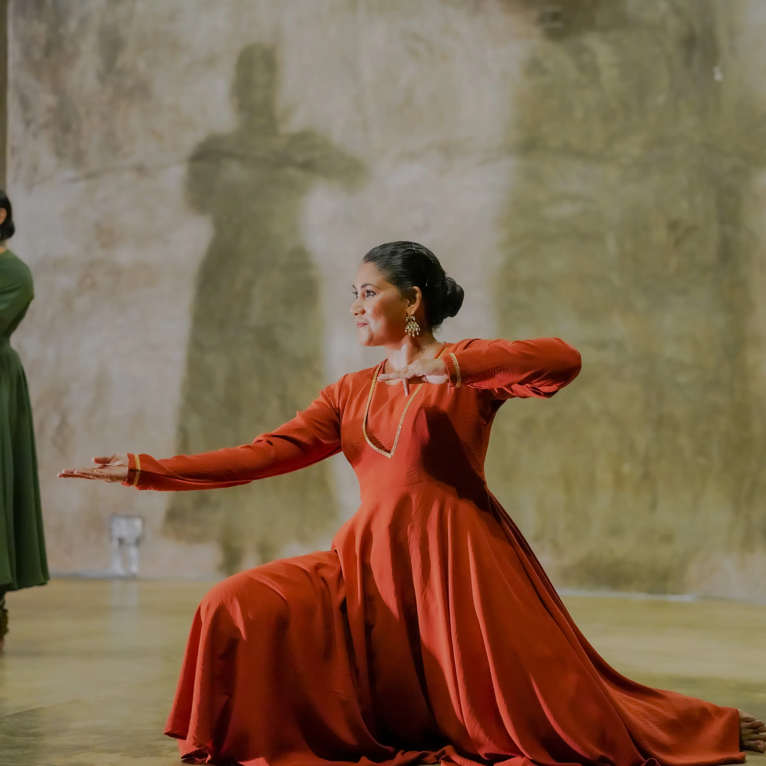 Thilakshini Ratnayake performing Classical Kathak Dance with stage shadow and mudras